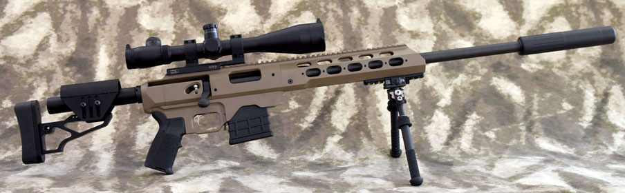 Picture of our first Modular Rifle Project; a MDT TAC21 20 inch Suppressed Modular Rifle. The rifle's major componants consist of a MDT Tac21 Remington 700 Rifle Bolt Action Chassis, Remington Model 700 Barreled Action, XLR Industries Stock, Atlas Bipod, AAA 308 Silencer, Vortex Viper PST 4-16x50 FFP Rifle scope with EBR-1 MOA PST-416F1-A and Rifle Basix Trigger. 